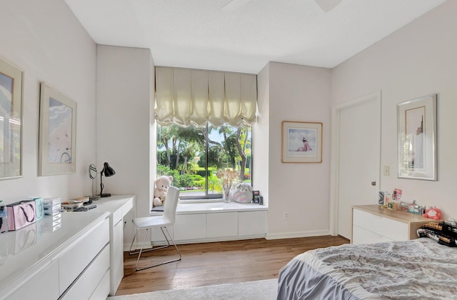 19411 Sabal Lake Dr Unit 5018, Boca Raton, FL 33434 - bedroom with light wood-style floors, an office area, and baseboards