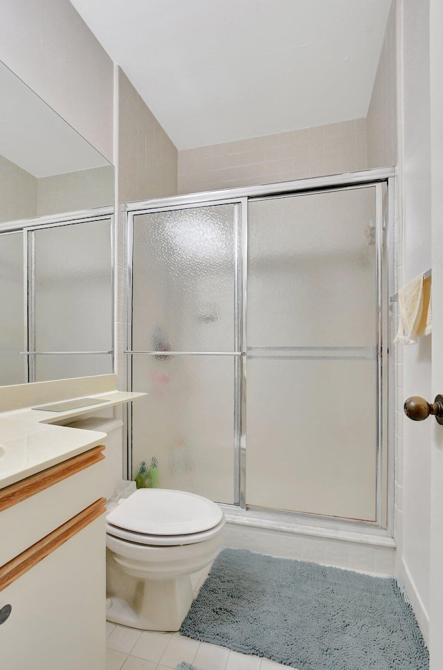 19411 Sabal Lake Dr Unit 5018, Boca Raton, FL 33434 - full bath with tile patterned floors, toilet, vanity, and a stall shower