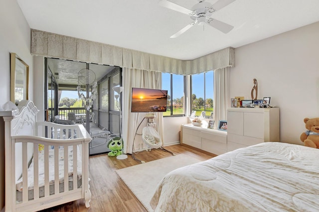 19411 Sabal Lake Dr Unit 5018, Boca Raton, FL 33434 - bedroom featuring wood finished floors, access to outside, baseboards, and ceiling fan