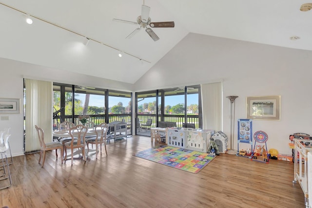 19411 Sabal Lake Dr Unit 5018, Boca Raton, FL 33434 - game room with rail lighting, ceiling fan, high vaulted ceiling, and light wood-style floors