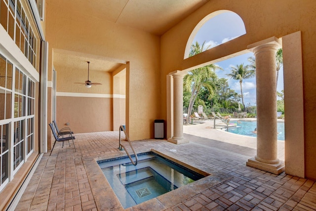 700 Scotia Dr Unit 202, Hypoluxo, FL 33462 - community pool with a patio area, a community hot tub, and ceiling fan