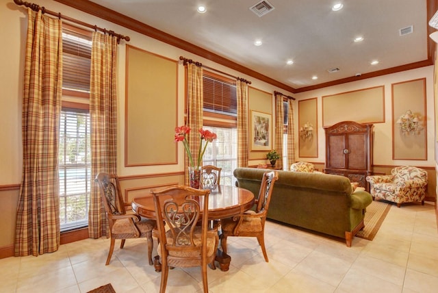 700 Scotia Dr Unit 202, Hypoluxo, FL 33462 - dining room featuring a decorative wall, crown molding, plenty of natural light, recessed lighting, and light tile patterned floors