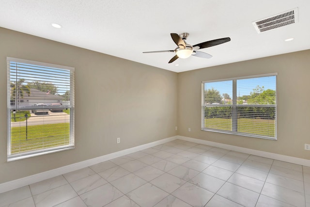 1897 SW Lofgren Ave, Port Saint Lucie, FL 34953 - empty room with ceiling fan, baseboards, and recessed lighting