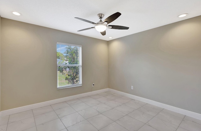 1897 SW Lofgren Ave, Port Saint Lucie, FL 34953 - unfurnished room featuring a ceiling fan, baseboards, recessed lighting, and light marble finish floors
