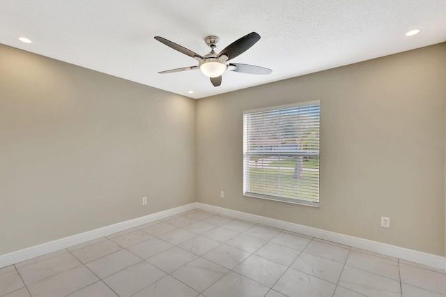 1897 SW Lofgren Ave, Port Saint Lucie, FL 34953 - empty room with a ceiling fan, baseboards, and recessed lighting