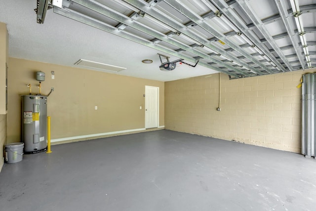 1897 SW Lofgren Ave, Port Saint Lucie, FL 34953 - garage featuring electric water heater, a garage door opener, and concrete block wall