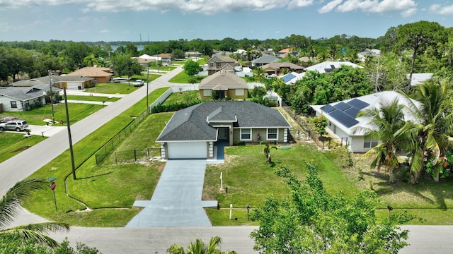 1897 SW Lofgren Ave, Port Saint Lucie, FL 34953 - aerial perspective of suburban area