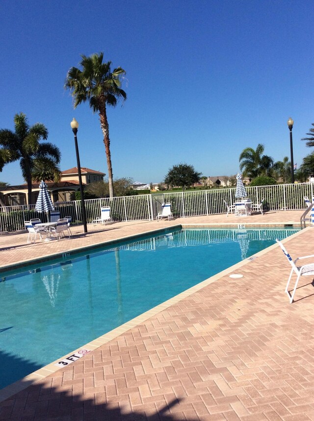 10552 SW Toren Way, Port Saint Lucie, FL 34987 - community pool with a patio