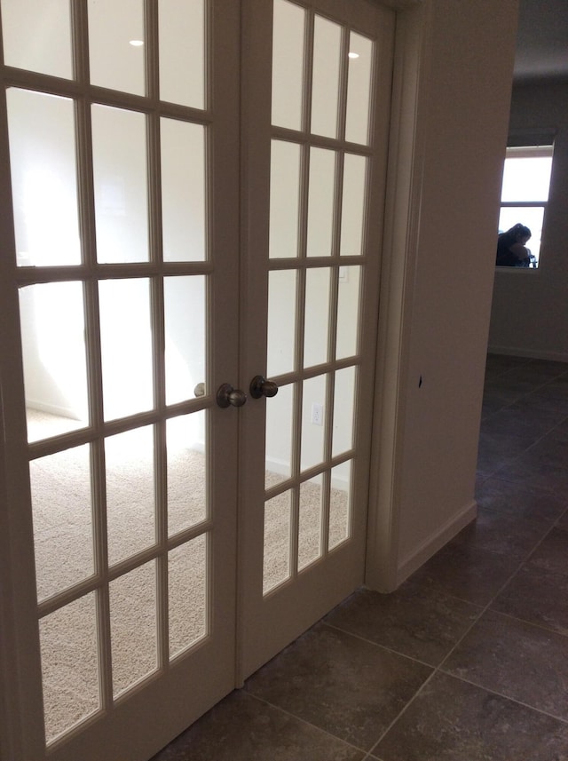 10552 SW Toren Way, Port Saint Lucie, FL 34987 - detailed view of french doors and baseboards