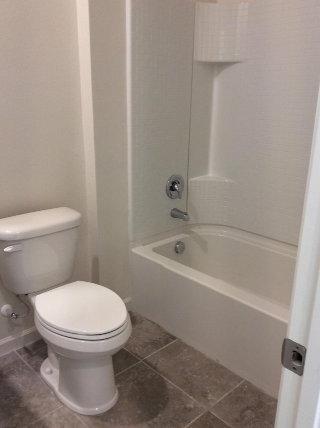 10552 SW Toren Way, Port Saint Lucie, FL 34987 - full bathroom with toilet, tile patterned floors, and bathing tub / shower combination