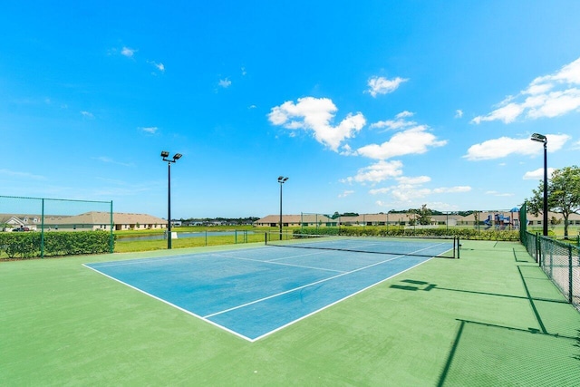 5174 Armina Pl, Fort Pierce, FL 34951 - view of tennis court with a residential view
