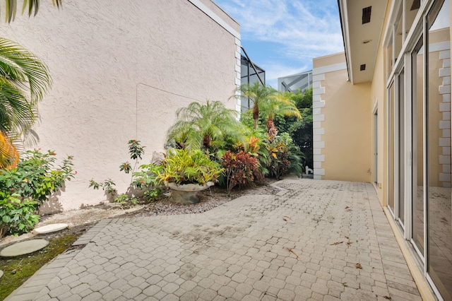 7729 Travlers Tree Dr, Boca Raton, FL 33433 - view of patio / terrace with a lanai