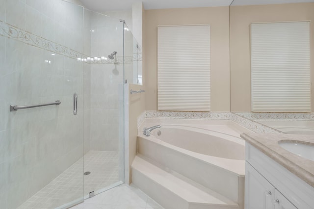 7729 Travlers Tree Dr, Boca Raton, FL 33433 - bathroom featuring a stall shower, a garden tub, vanity, and tile patterned flooring