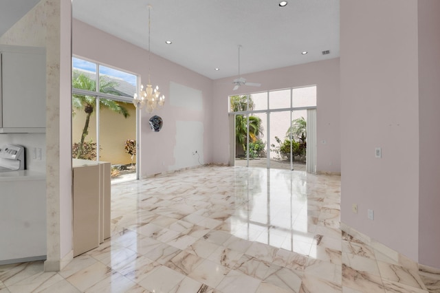 7729 Travlers Tree Dr, Boca Raton, FL 33433 - spare room with ceiling fan, a chandelier, recessed lighting, and light marble finish flooring