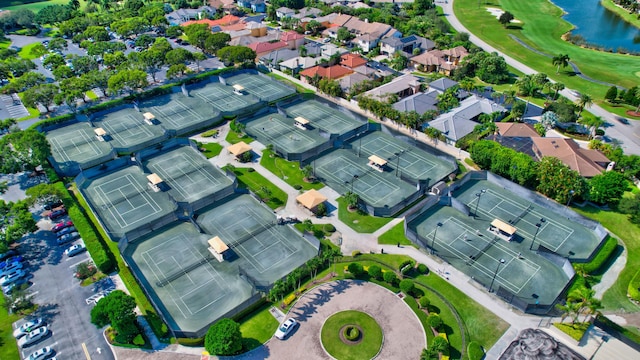7729 Travlers Tree Dr, Boca Raton, FL 33433 - aerial view of property's location with a large body of water, nearby suburban area, and a local golf course