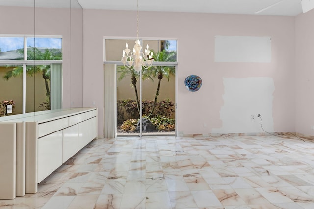 7729 Travlers Tree Dr, Boca Raton, FL 33433 - unfurnished dining area featuring a chandelier