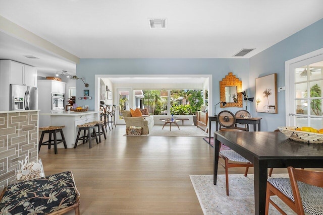 164 Bryn Mawr Dr, Lake Worth Beach, FL 33460 - dining space with light wood-type flooring