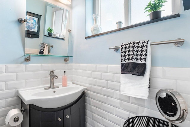 164 Bryn Mawr Dr, Lake Worth Beach, FL 33460 - half bathroom with vanity, wainscoting, and tile walls