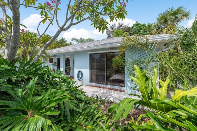 164 Bryn Mawr Dr, Lake Worth Beach, FL 33460 - back of house with stucco siding