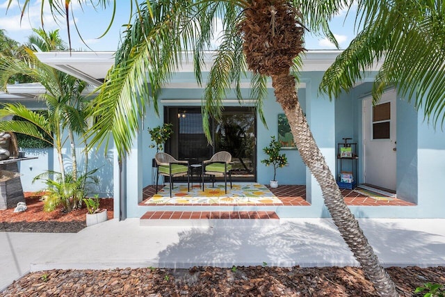 164 Bryn Mawr Dr, Lake Worth Beach, FL 33460 - property entrance with stucco siding