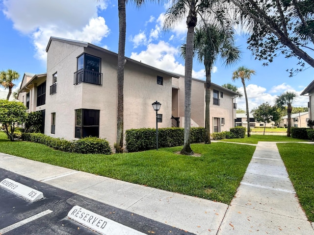 3400 NW 47th Ave Unit 3161, Coconut Creek, FL 33063 - view of property featuring uncovered parking