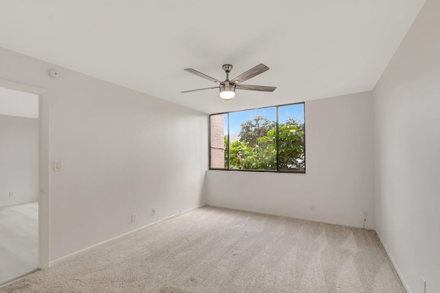 4345 Trevi Ct Unit 203, Lake Worth, FL 33467 - unfurnished room featuring a ceiling fan, carpet flooring, and baseboards