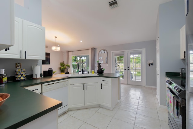 143 Monterey Way, Royal Palm Beach, FL 33411 - kitchen featuring dishwasher, wall oven, dark countertops, a sink, and french doors