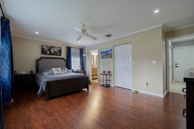 143 Monterey Way, Royal Palm Beach, FL 33411 - bedroom with wood finished floors, recessed lighting, a ceiling fan, baseboards, and ensuite bath