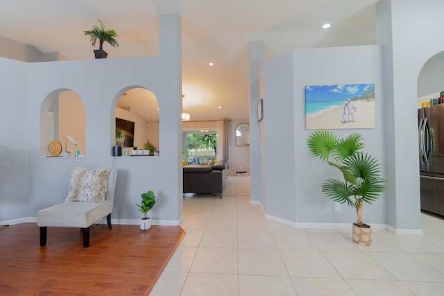 143 Monterey Way, Royal Palm Beach, FL 33411 - hall with recessed lighting, light tile patterned floors, and baseboards