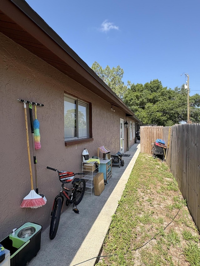 305 E 6th St, Lehigh Acres, FL 33972 - view of yard featuring a patio area