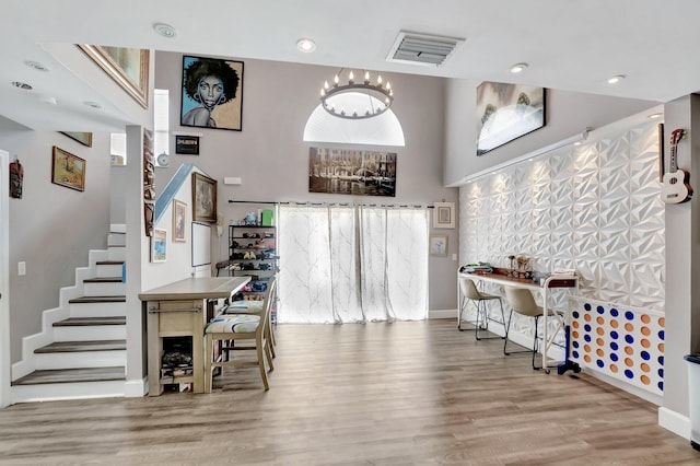 22360 Overture Cir, Boca Raton, FL 33428 - dining room featuring wood finished floors, stairs, baseboards, recessed lighting, and a chandelier