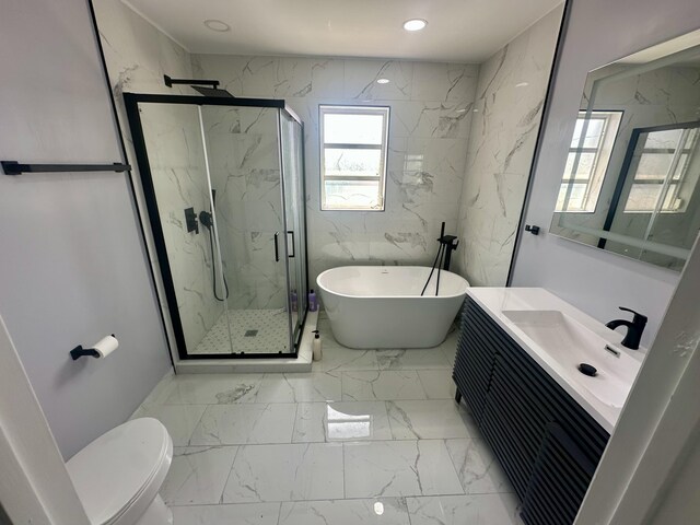 22360 Overture Cir, Boca Raton, FL 33428 - full bath featuring marble finish floors, vanity, a marble finish shower, a freestanding tub, and toilet