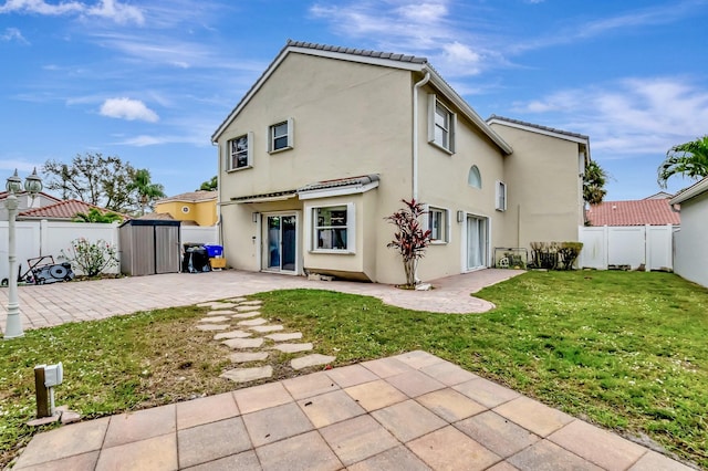 22360 Overture Cir, Boca Raton, FL 33428 - back of property featuring a patio, stucco siding, and a tile roof