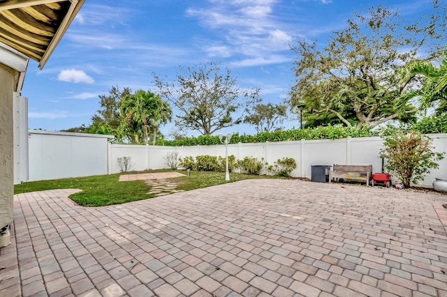 22360 Overture Cir, Boca Raton, FL 33428 - fenced backyard featuring a patio area
