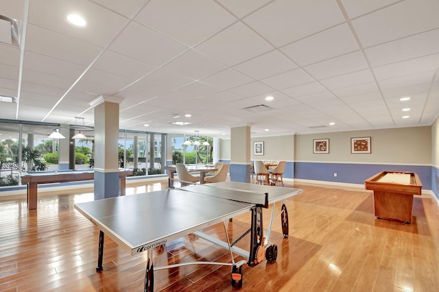 3546 S Ocean Blvd Unit 203, South Palm Beach, FL 33480 - recreation room with light wood-style floors, a paneled ceiling, baseboards, and recessed lighting