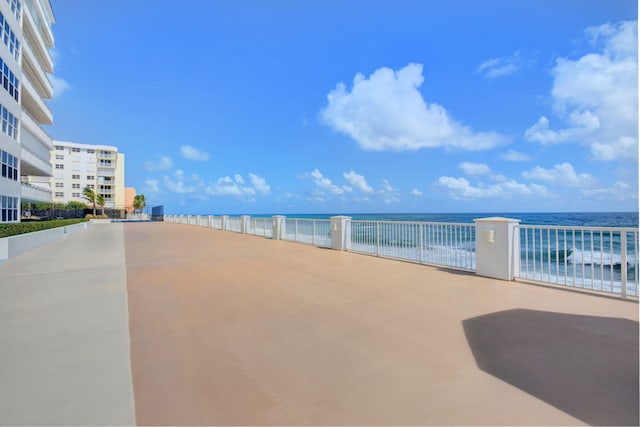 3546 S Ocean Blvd Unit 203, South Palm Beach, FL 33480 - view of patio with a water view