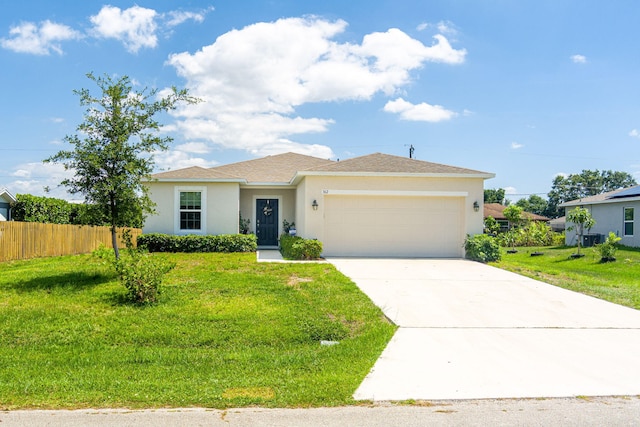 362 SW Buswell Ave, Port Saint Lucie, FL 34983 - ranch-style house with stucco siding, an attached garage, driveway, and roof with shingles