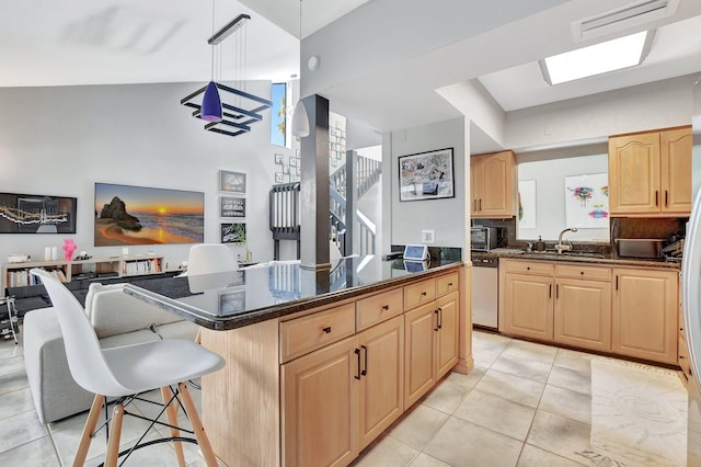 6650 Thornhill Ct, Boca Raton, FL 33433 - kitchen featuring light brown cabinets, dishwasher, a sink, a kitchen bar, and light tile patterned floors