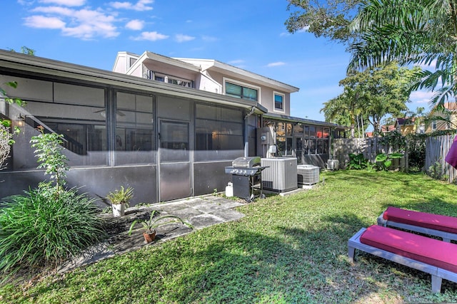 6650 Thornhill Ct, Boca Raton, FL 33433 - back of property with a sunroom and cooling unit