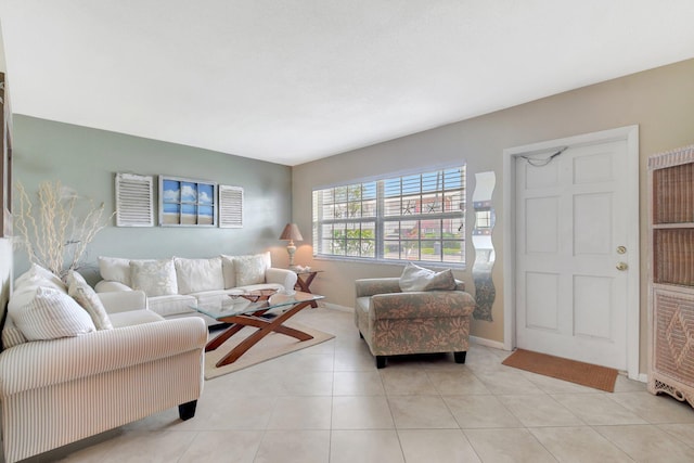 5505 N Ocean Blvd Unit 13-105, Ocean Ridge, FL 33435 - living area with light tile patterned flooring and baseboards