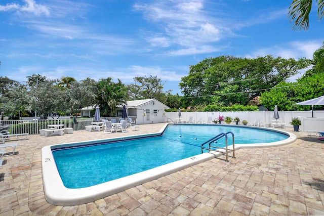 5505 N Ocean Blvd Unit 13-105, Ocean Ridge, FL 33435 - community pool with a patio