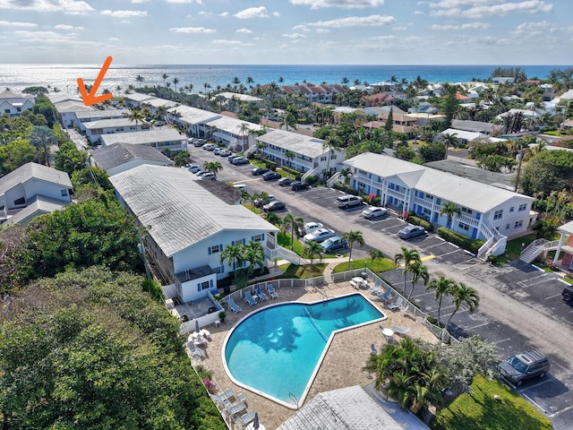 5505 N Ocean Blvd Unit 13-105, Ocean Ridge, FL 33435 - bird's eye view of a pool area and a large body of water