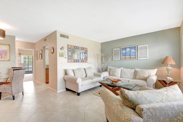 5505 N Ocean Blvd Unit 13-105, Ocean Ridge, FL 33435 - living area featuring light tile patterned floors and baseboards