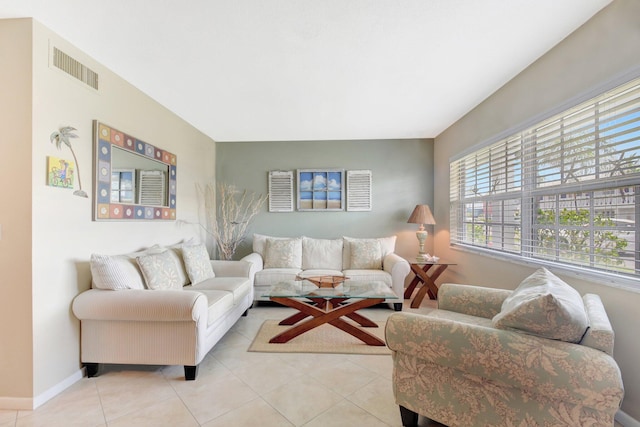 5505 N Ocean Blvd Unit 13-105, Ocean Ridge, FL 33435 - living area featuring light tile patterned floors and baseboards