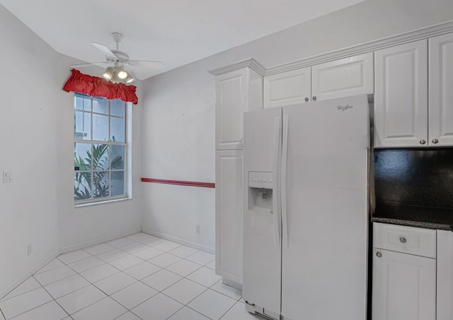 7886 Laina Ln Unit 2, Boynton Beach, FL 33437 - kitchen featuring white refrigerator with ice dispenser, white cabinets, a ceiling fan, baseboards, and light tile patterned floors