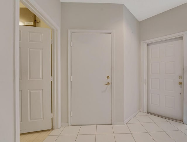 7886 Laina Ln Unit 2, Boynton Beach, FL 33437 - entryway with light tile patterned floors and baseboards