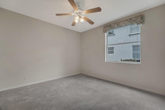7886 Laina Ln Unit 2, Boynton Beach, FL 33437 - carpeted empty room with a ceiling fan and baseboards