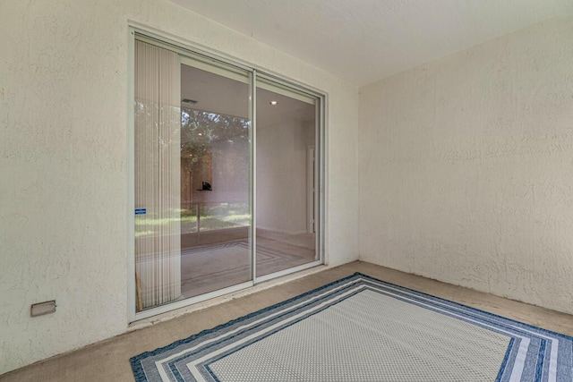 7886 Laina Ln Unit 2, Boynton Beach, FL 33437 - unfurnished room with a textured wall