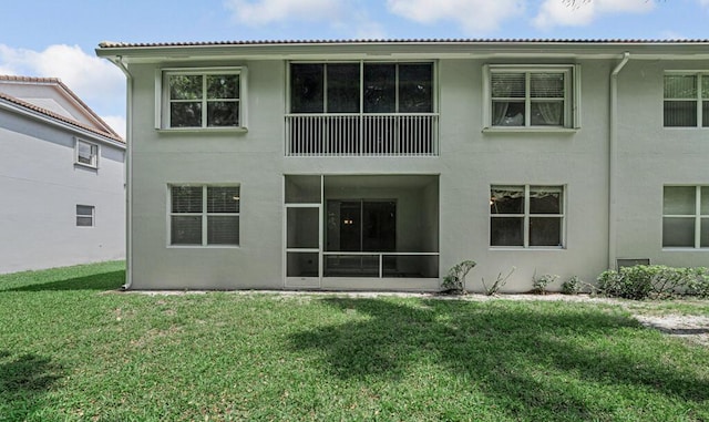 7886 Laina Ln Unit 2, Boynton Beach, FL 33437 - back of house featuring a yard and stucco siding