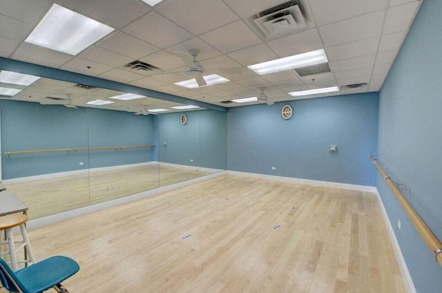 7886 Laina Ln Unit 2, Boynton Beach, FL 33437 - empty room with wood finished floors, baseboards, a paneled ceiling, and a ceiling fan